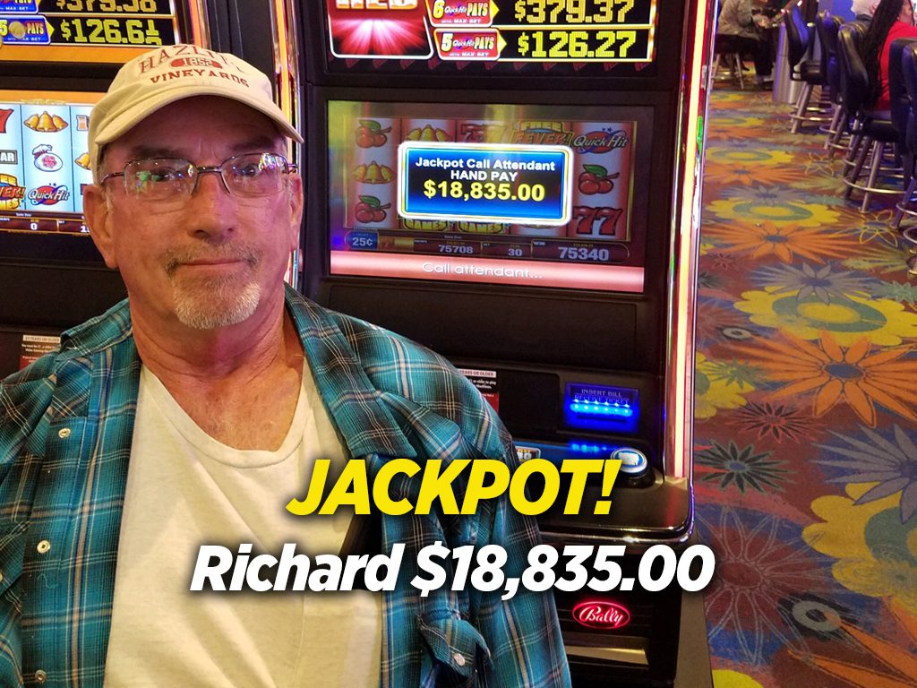 A man standing in front of a slot machine with the words jackpot richard.