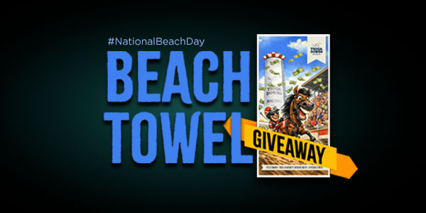 Image with large blue text "BEACH TOWEL" and a smaller yellow banner reading "GIVEAWAY" over a vintage poster, with hashtag #NationalBeachDay at the top.