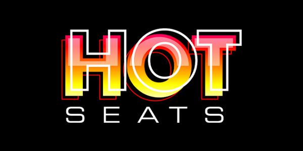 Bold text reading "HOT SEATS" with a gradient of red, orange, and yellow on a black background.