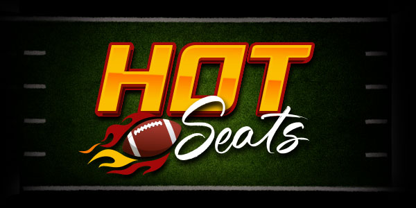 Hot Seats“ text with a flaming football graphic on a green football field background with white yard lines.